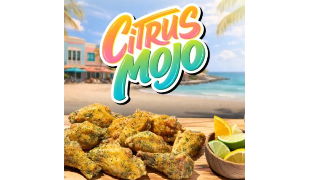 Seasoned chicken wings with citrus mojo flavor and lime wedges highlighting sweet and tangy menu trend