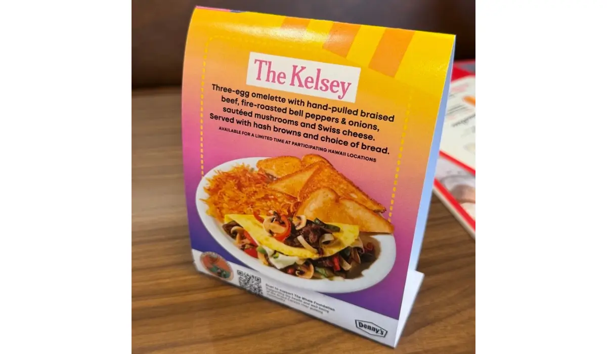 Table display promoting The Kelsey omelette, a three-egg Philly Cheesesteak Omelette inspired by Kelsey Pfendler at participating Denny's Hawaii restaurants.